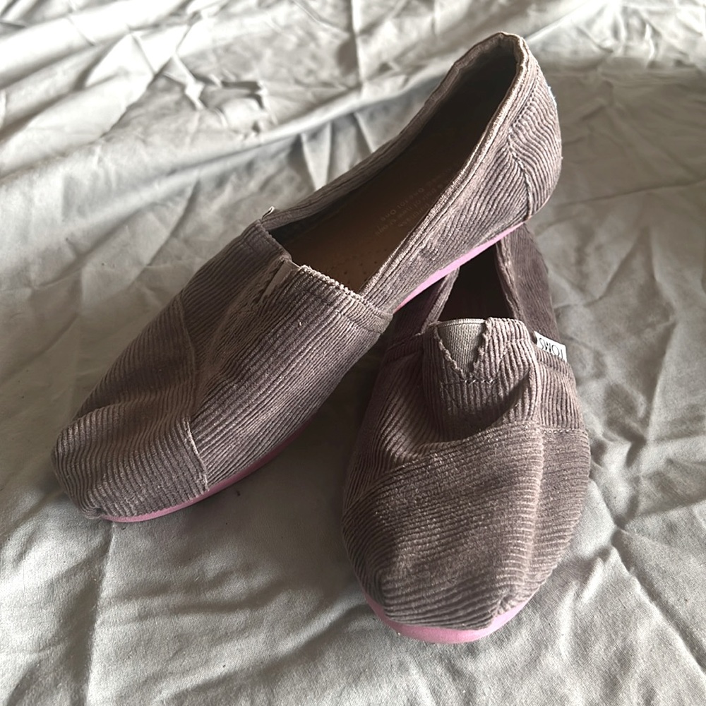 Tom’s dark grey corduroy slip-ons